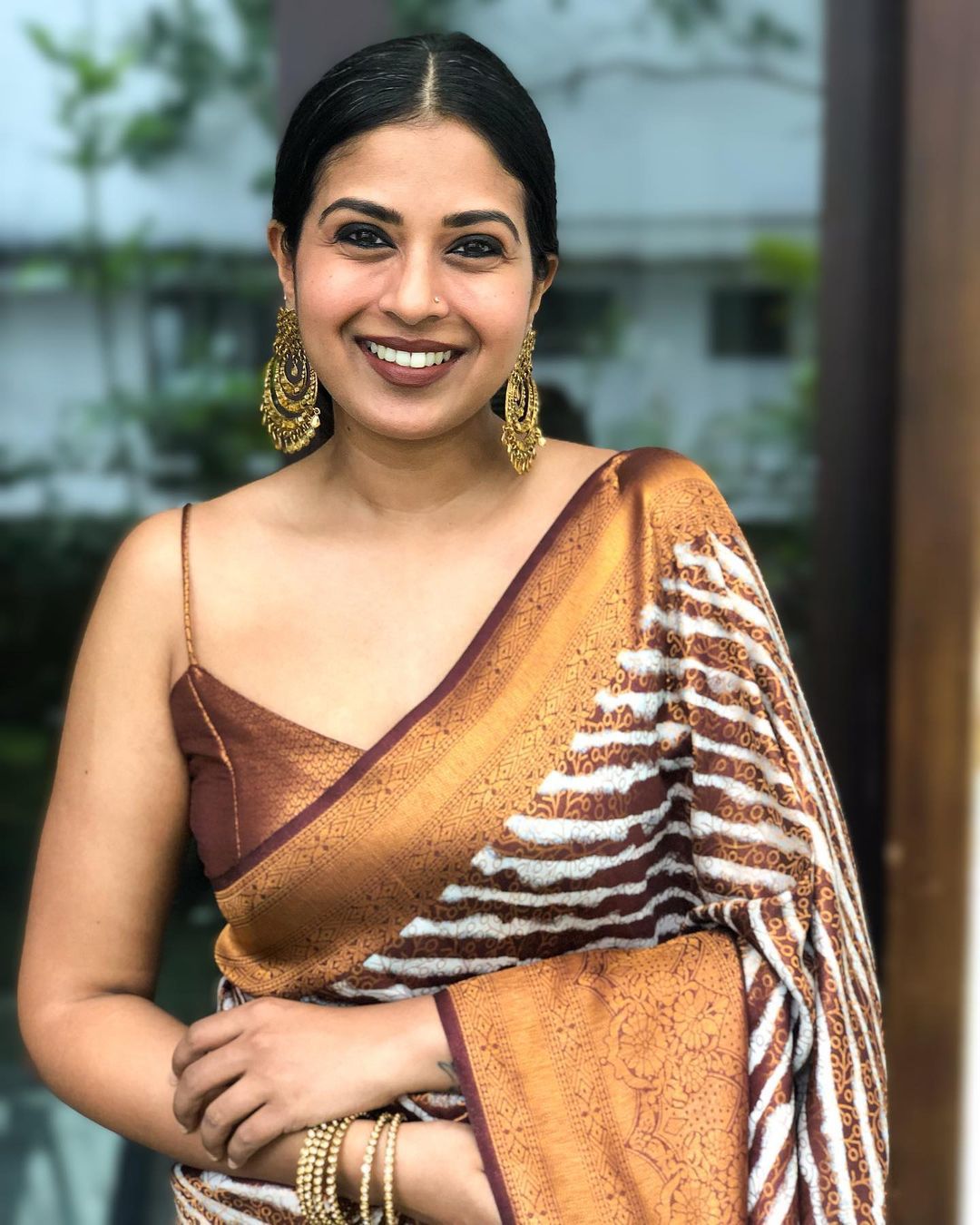 Symmetrical Brown Soft Silk Saree with Artistic Blouse Piece