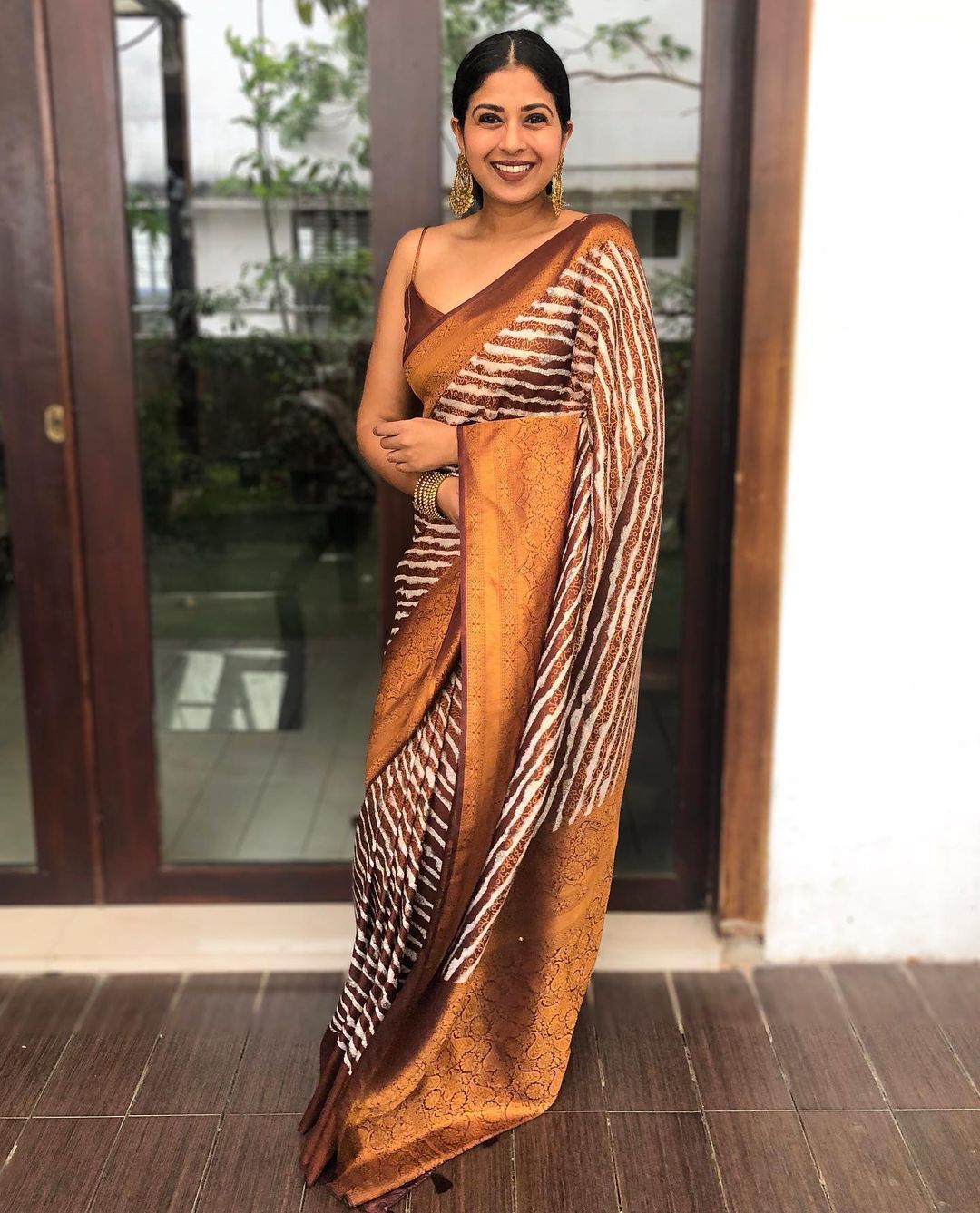 Symmetrical Brown Soft Silk Saree with Artistic Blouse Piece