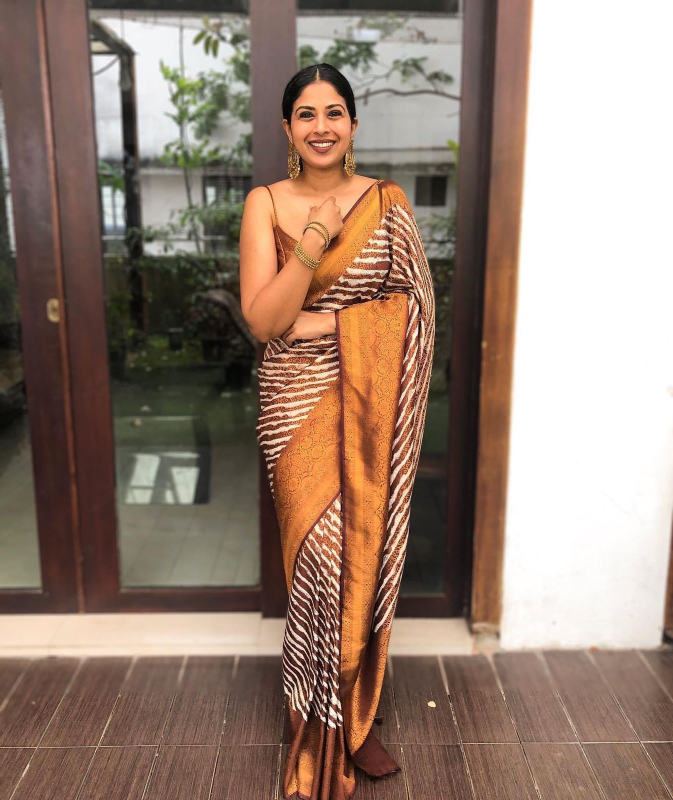 Symmetrical Brown Soft Silk Saree with Artistic Blouse Piece