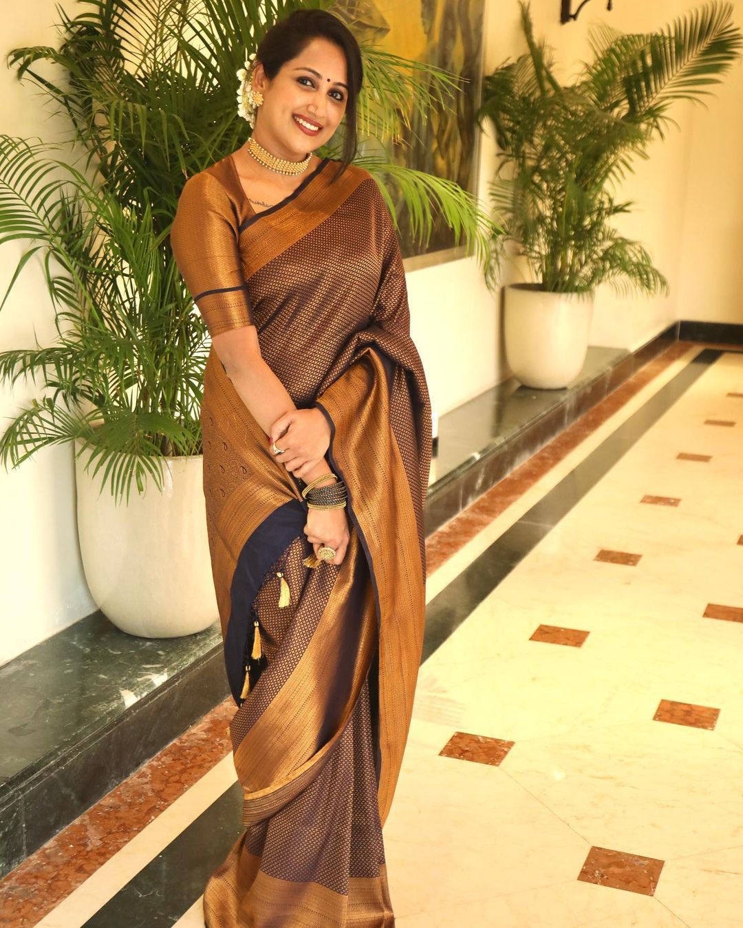 Cynosure Black Soft Silk Saree with Demure Blouse Piece