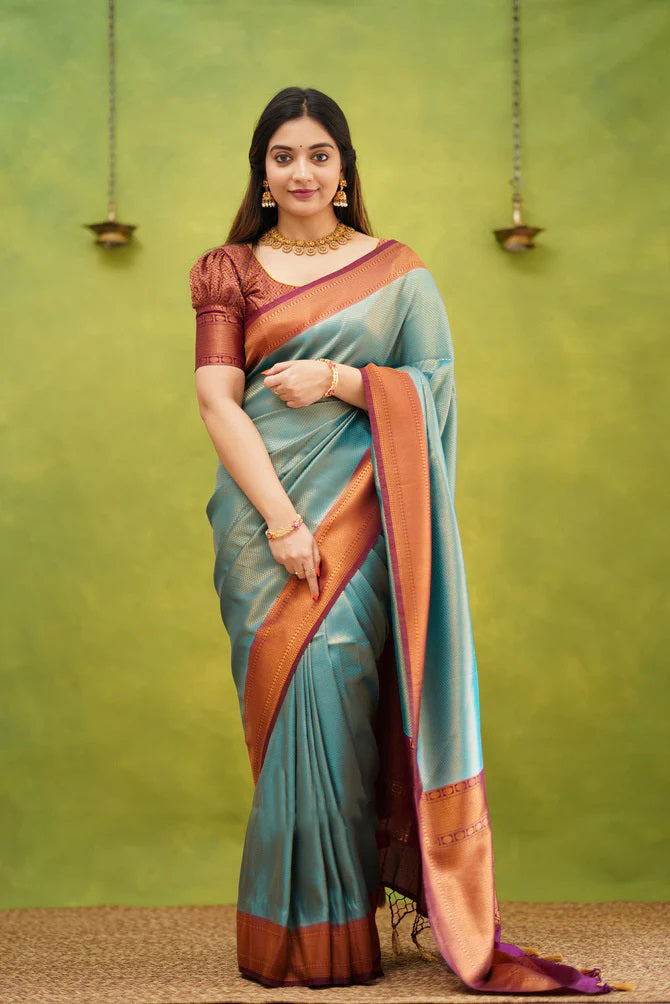 Unique Firozi Soft Banarasi Silk Saree With Exquisite Blouse Piece