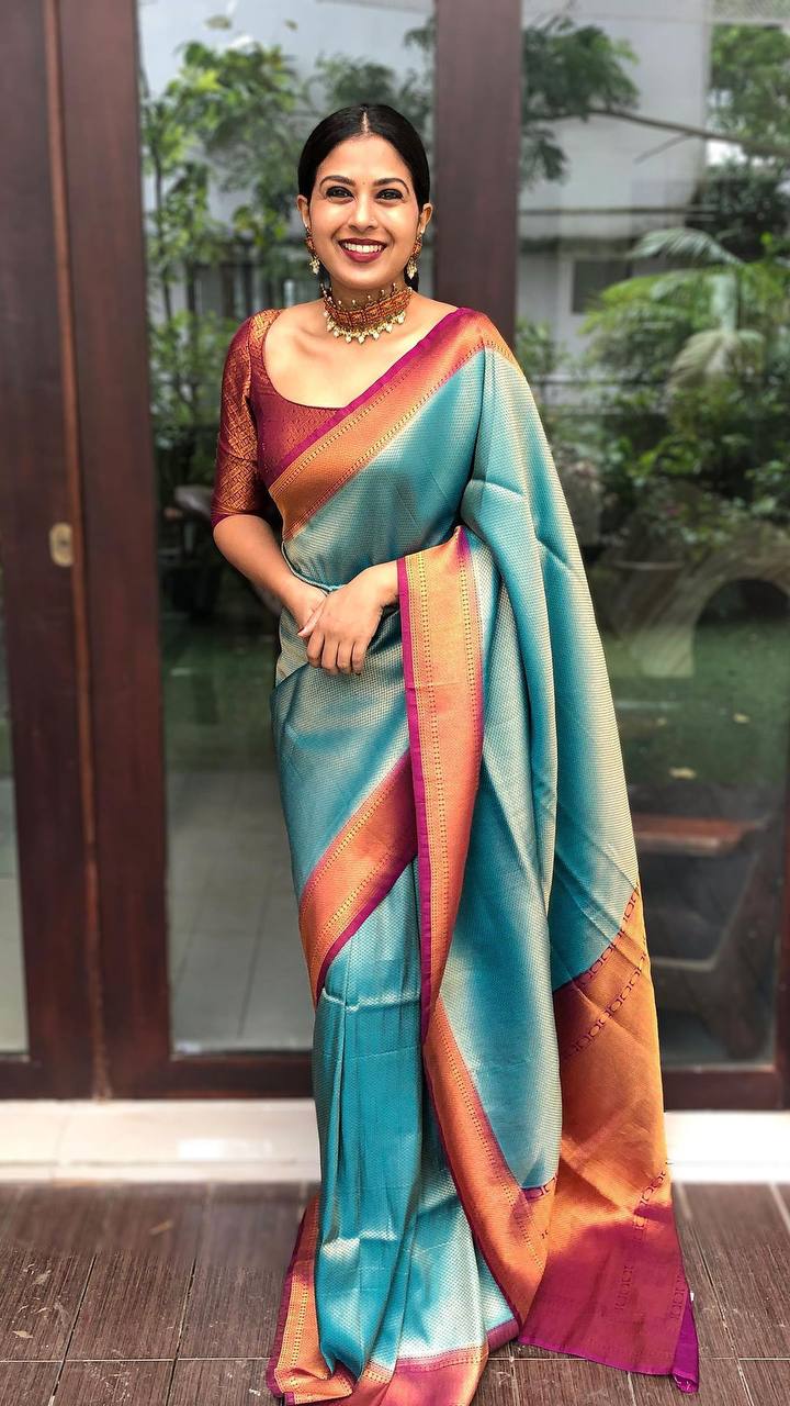 Smart glam Rama Soft Silk Saree with Brood Blouse Piece