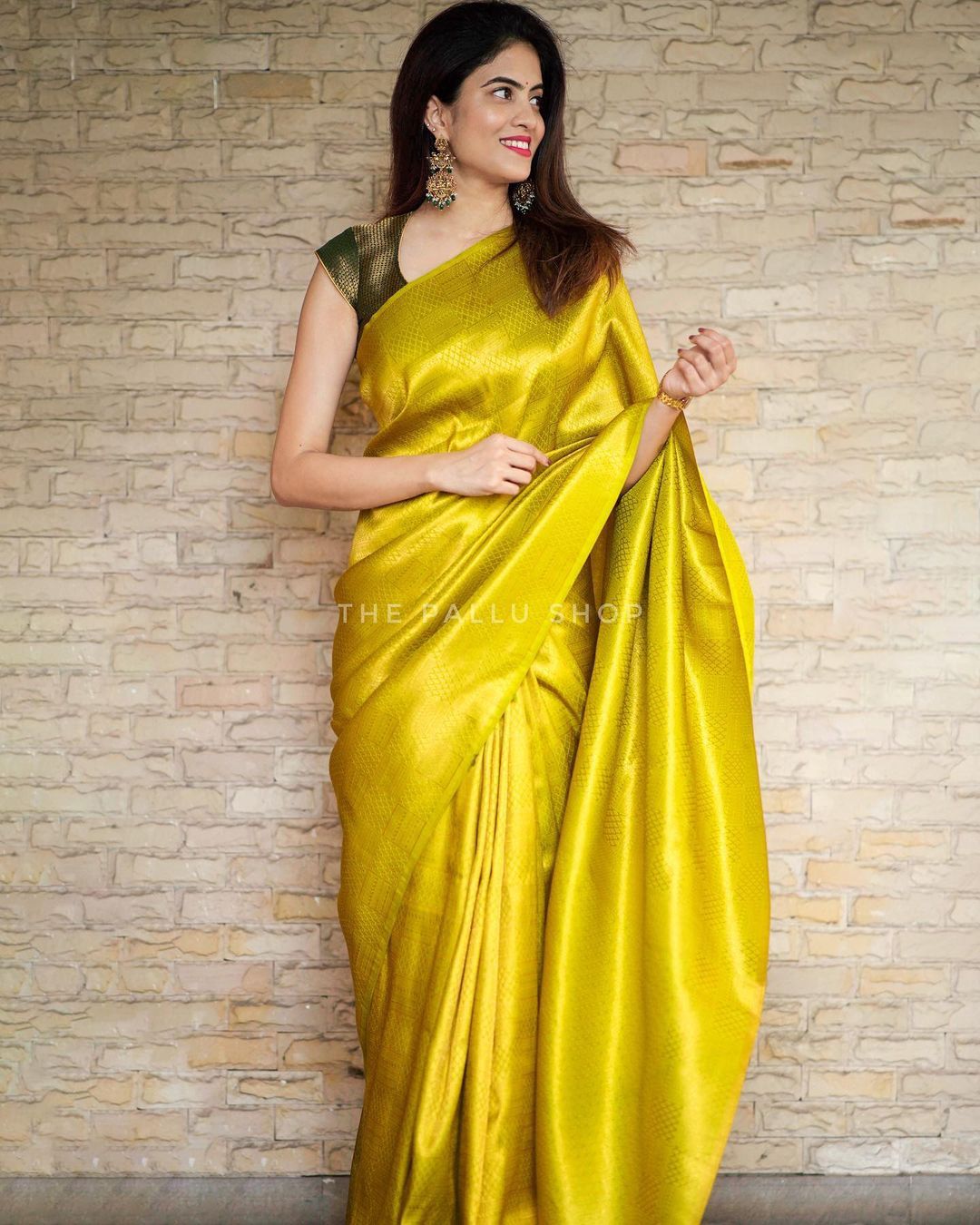 Sumptuous Yellow Soft Silk Saree with Vestigial Blouse Piece