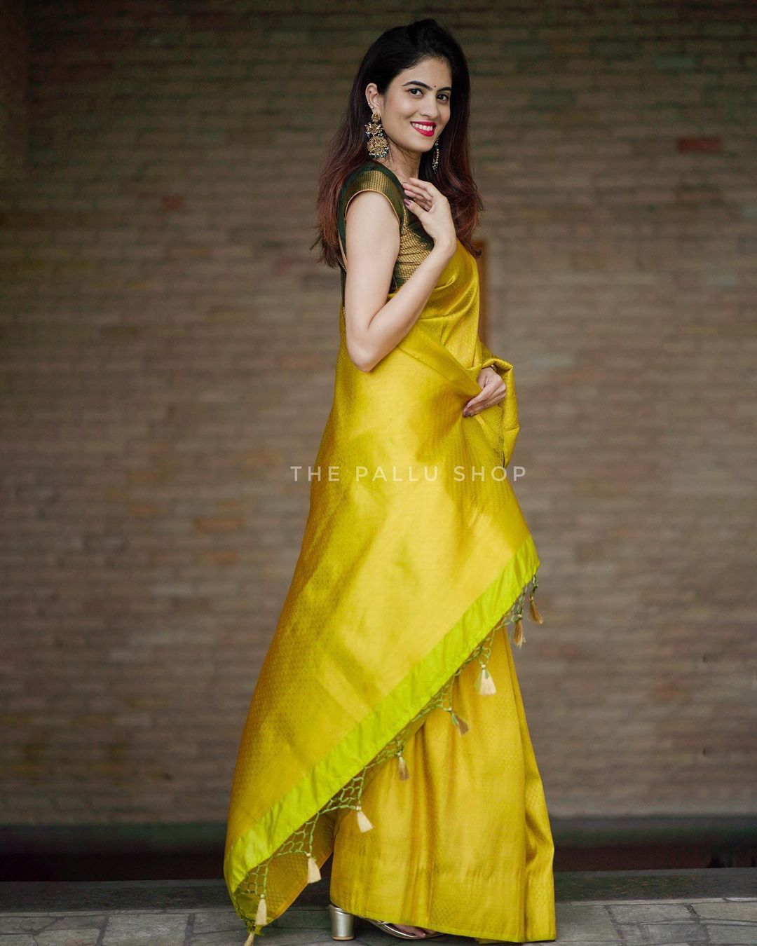 Sumptuous Yellow Soft Silk Saree with Vestigial Blouse Piece