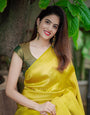 Sumptuous Yellow Soft Silk Saree with Vestigial Blouse Piece