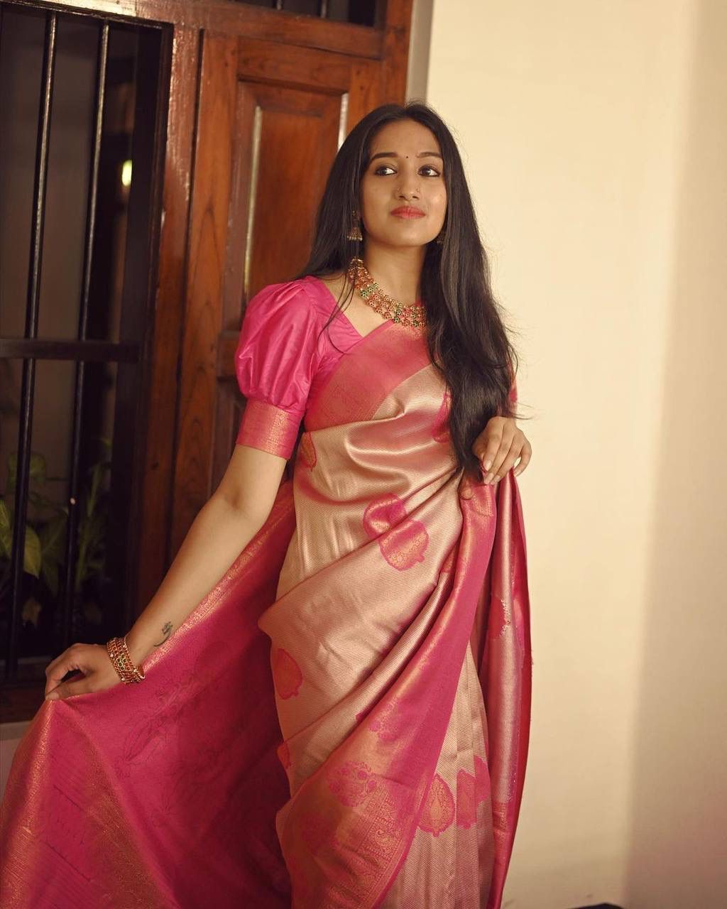 Radiant Peach Soft Silk Saree With Exceptional Blouse Piece