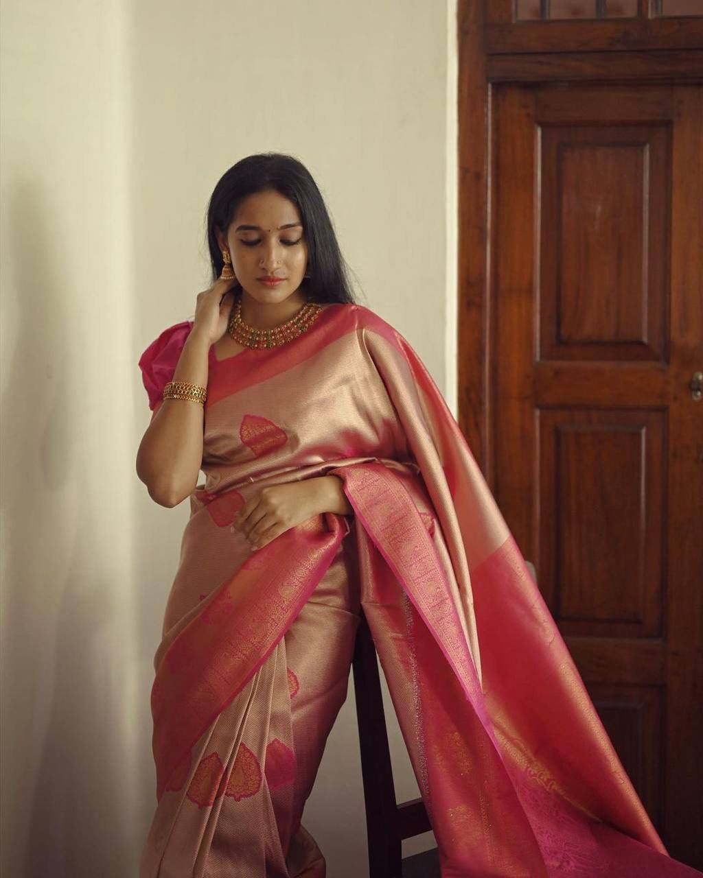 Radiant Peach Soft Silk Saree With Exceptional Blouse Piece