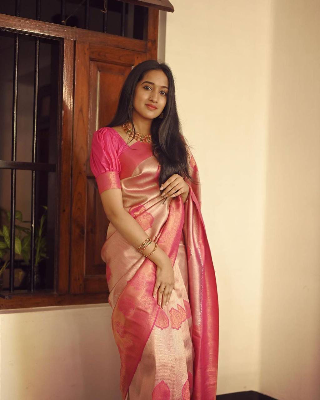 Radiant Peach Soft Silk Saree With Exceptional Blouse Piece