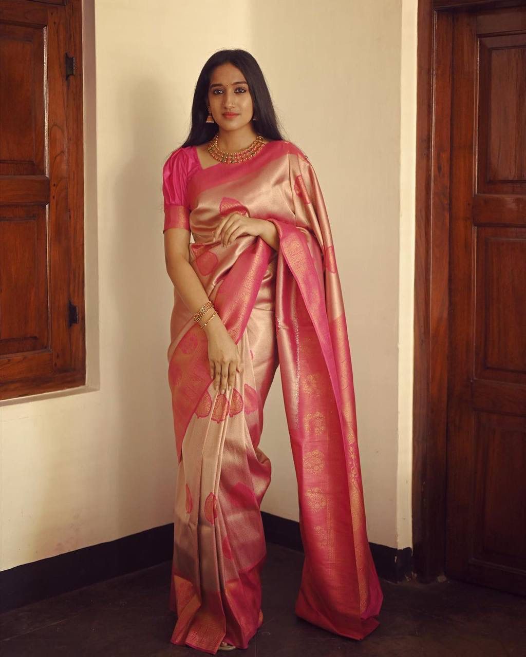 Radiant Peach Soft Silk Saree With Exceptional Blouse Piece