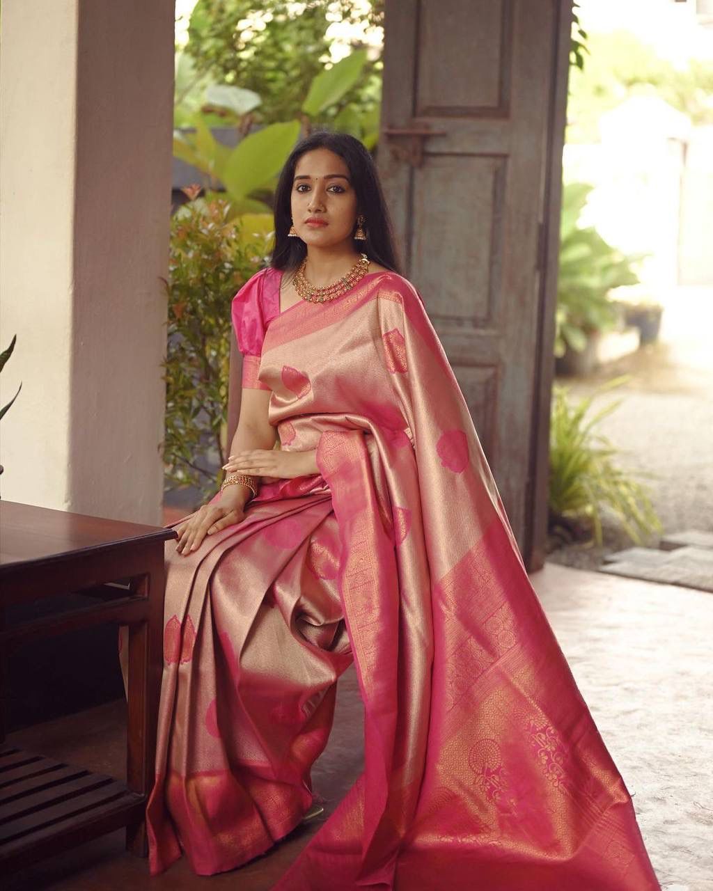 Radiant Peach Soft Silk Saree With Exceptional Blouse Piece