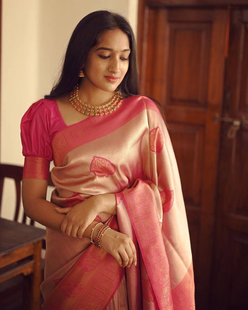 Radiant Peach Soft Silk Saree With Exceptional Blouse Piece