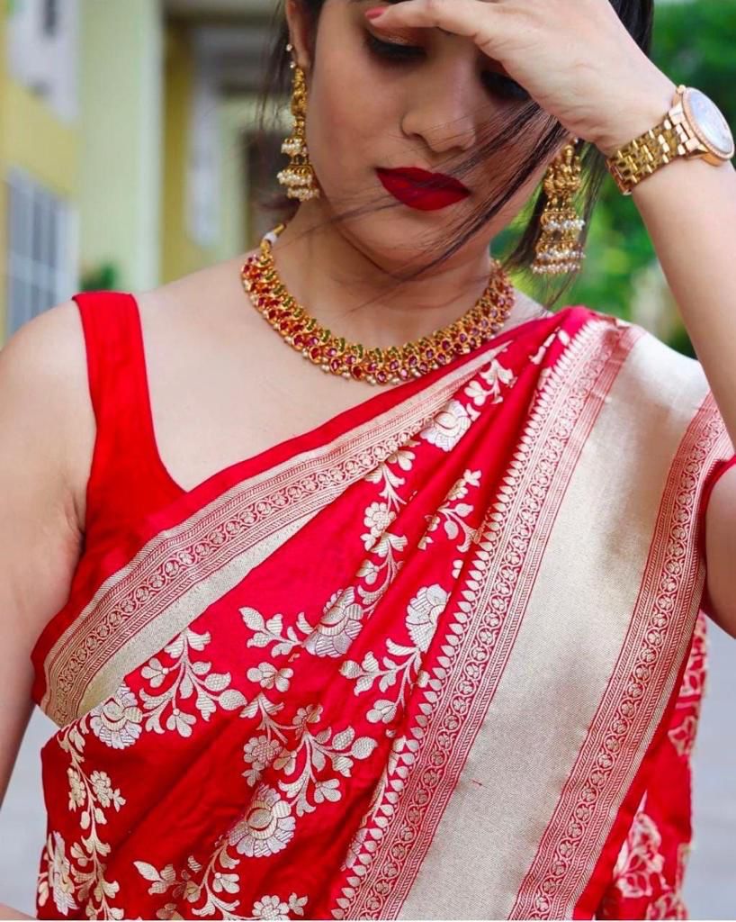 Appealing Red Soft Banarasi Silk Saree With Cynosure Blouse Piece