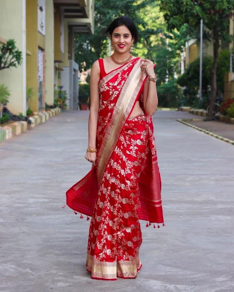 Appealing Red Soft Banarasi Silk Saree With Cynosure Blouse Piece