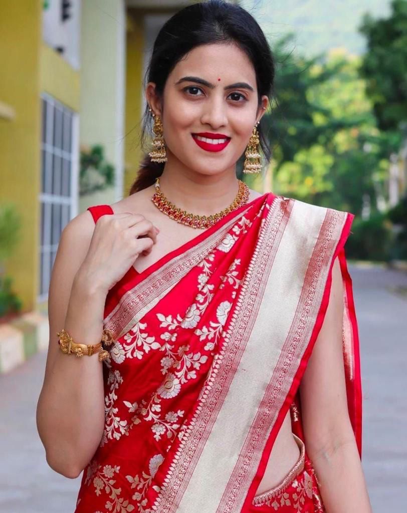 Appealing Red Soft Banarasi Silk Saree With Cynosure Blouse Piece