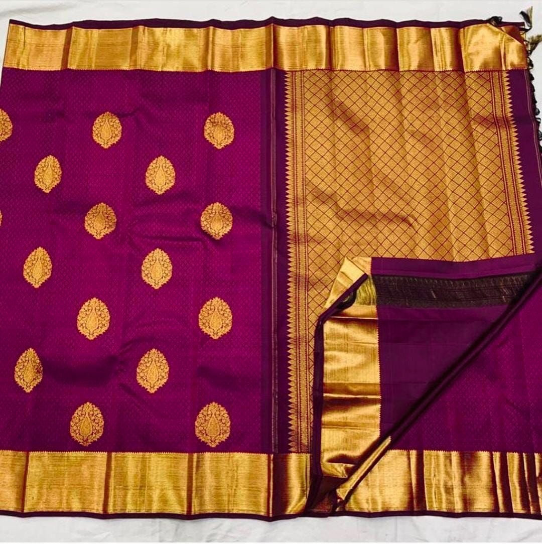 Grandiose Magenta Soft Banarasi Silk Saree With Jazzy Blouse Piece