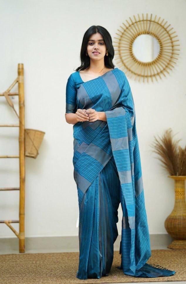 Hypnotic Firozi Soft Silk Saree With Opulent Blouse Piece