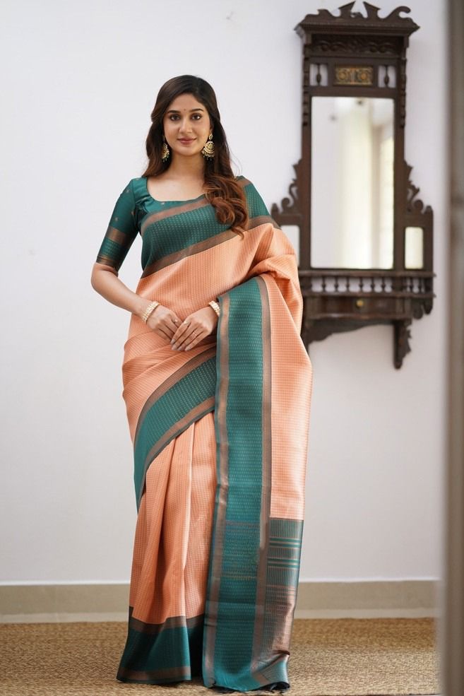 Gorgeous Peach Soft Silk Saree With Mesmerising Blouse Piece