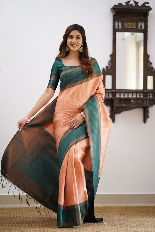 Gorgeous Peach Soft Silk Saree With Mesmerising Blouse Piece