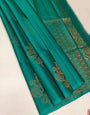 Charming Firozi Soft Silk Saree With Most Flattering Blouse Piece