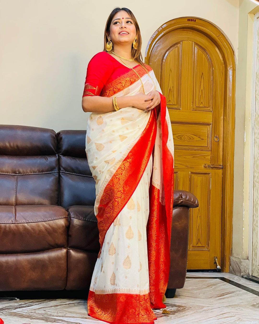 Opulent White Soft Banarasi Silk Saree with Elision Blouse Piece