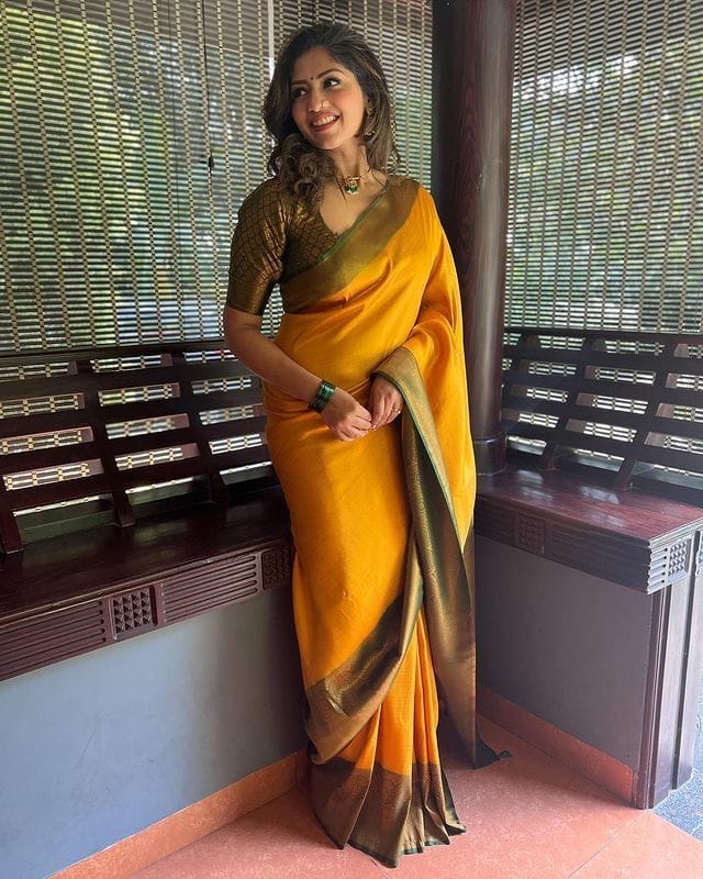 Admirable Yellow Soft Silk Saree with Bewitching Blouse Piece