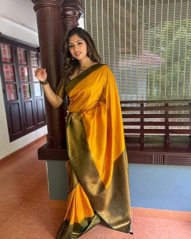 Admirable Yellow Soft Silk Saree with Bewitching Blouse Piece