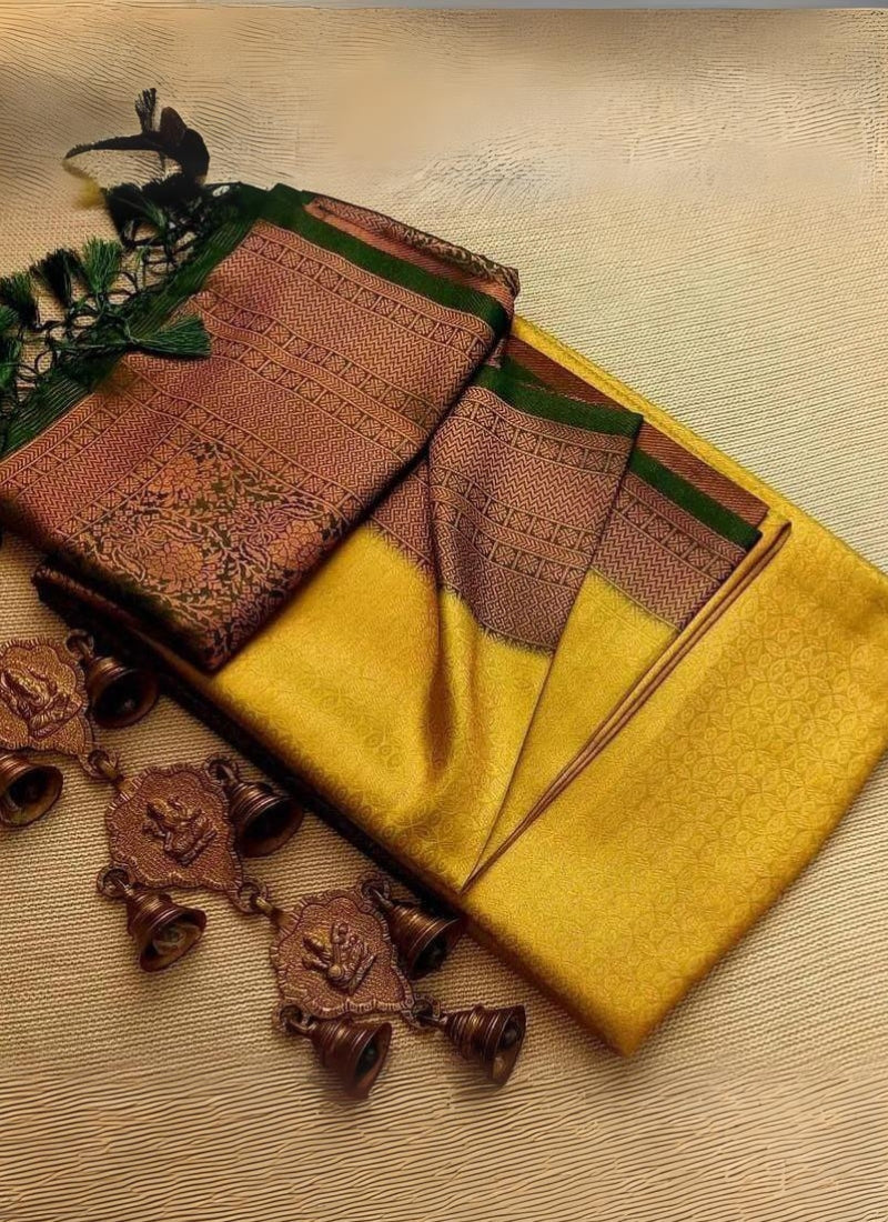 Ravishing Yellow Kanjivaram Silk Saree With Alluring Blouse Piece