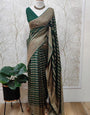 Pulsating Dark Green Soft Banarasi Silk Saree With A dreamy Blouse Piece