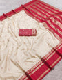 Denouement Beige Pure Zari Weaving Banarasi Silk Saree With Posh Blouse Piece