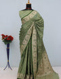 Intricate Green Banarasi Satin Silk Saree With Splendiferous Blouse