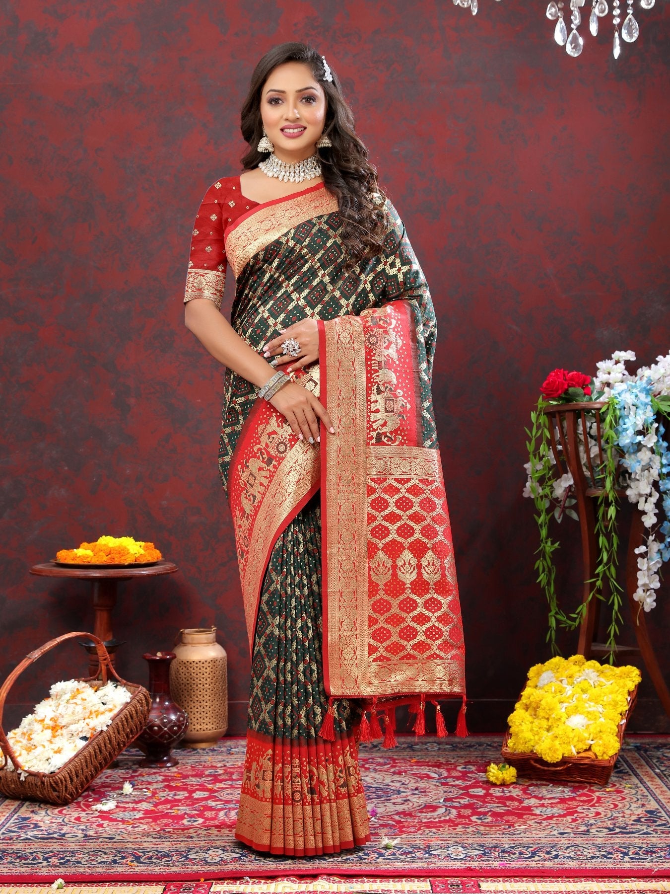 Engrossing Dark Green Patola Silk Saree with Most Stunning Blouse Piece