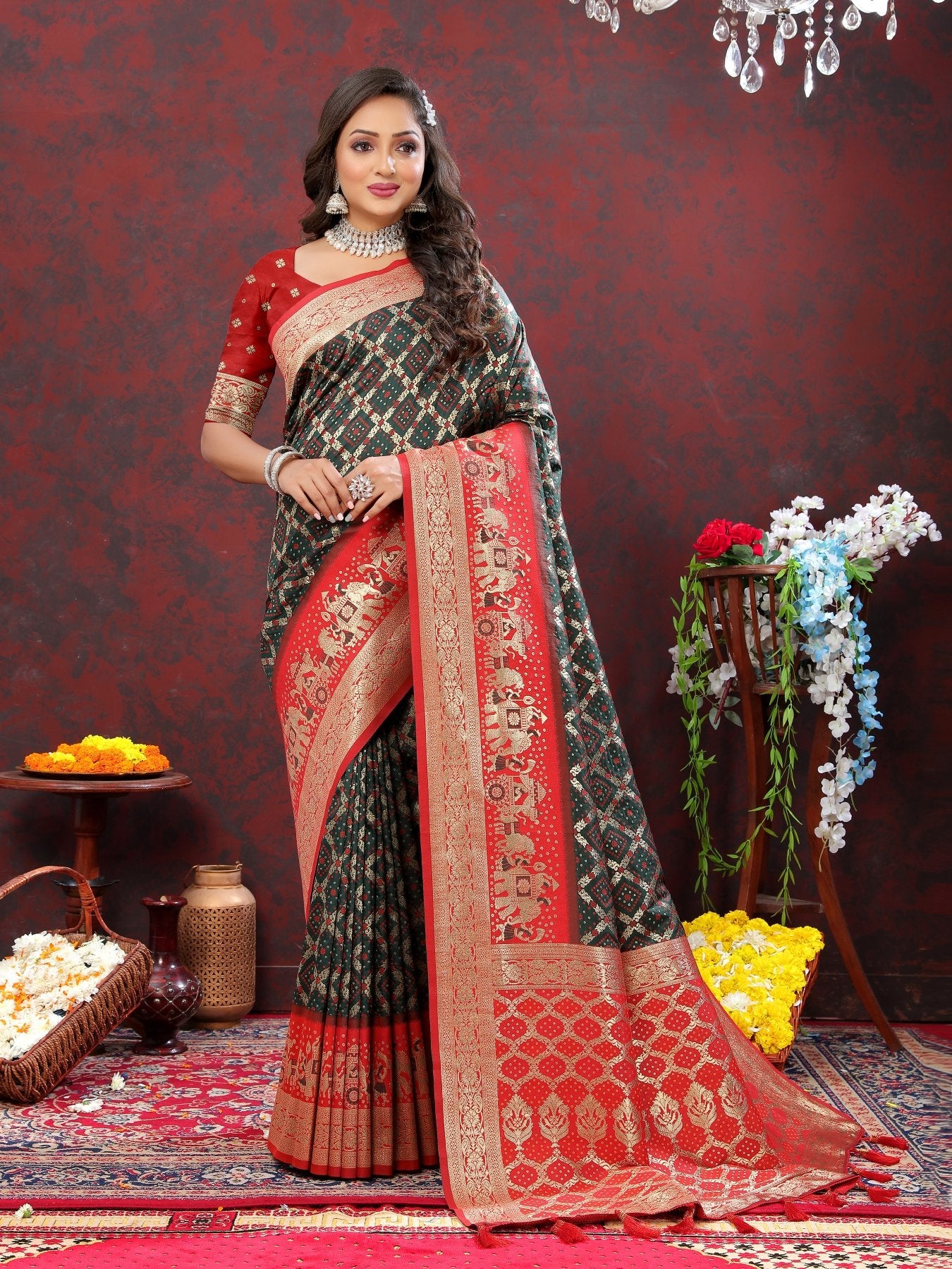 Engrossing Dark Green Patola Silk Saree with Most Stunning Blouse Piece