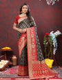 Engrossing Dark Green Patola Silk Saree with Most Stunning Blouse Piece