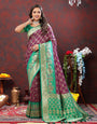 Adoring Wine Patola Silk Saree with Glorious Blouse Piece