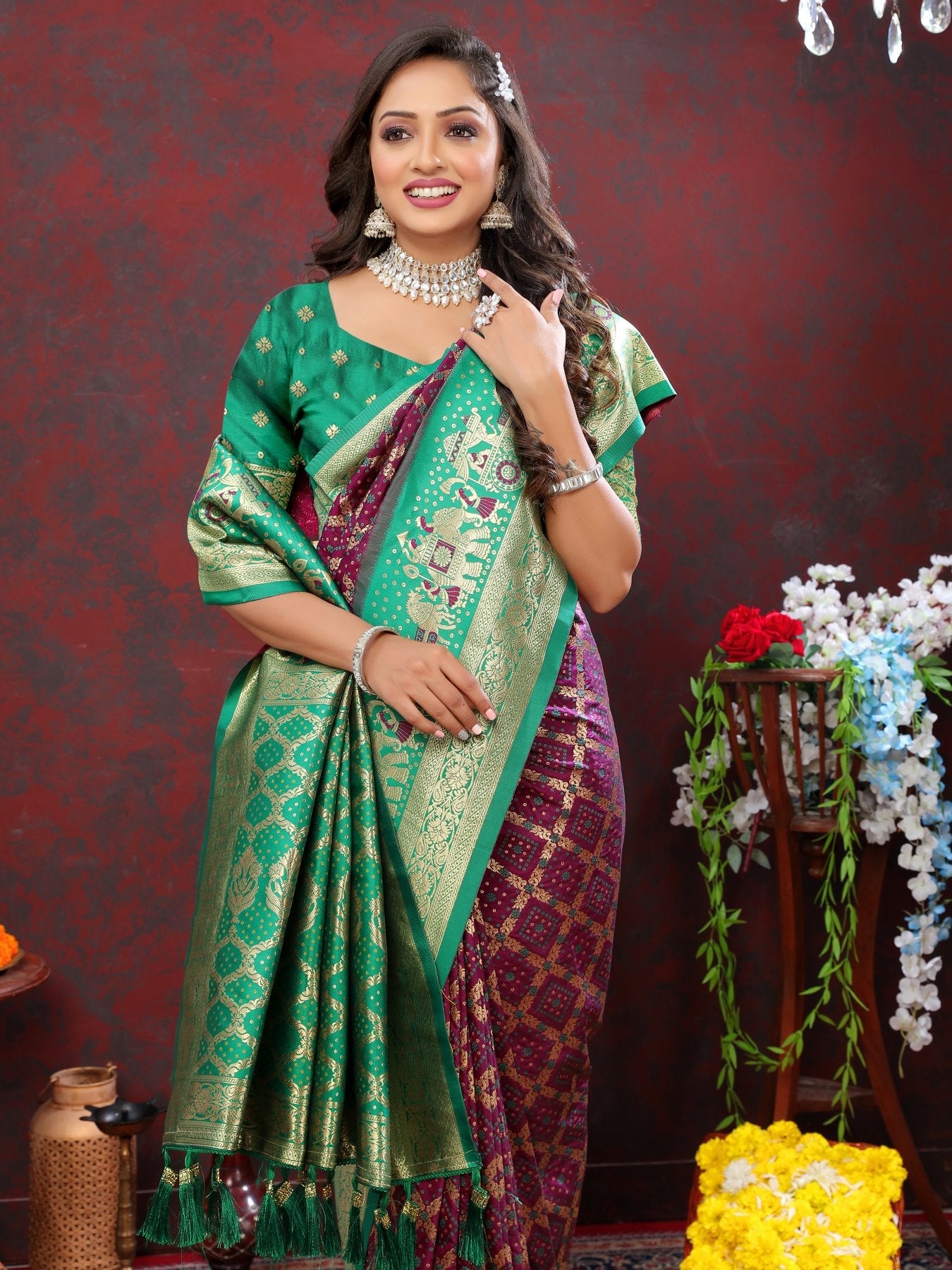 Adoring Wine Patola Silk Saree with Glorious Blouse Piece