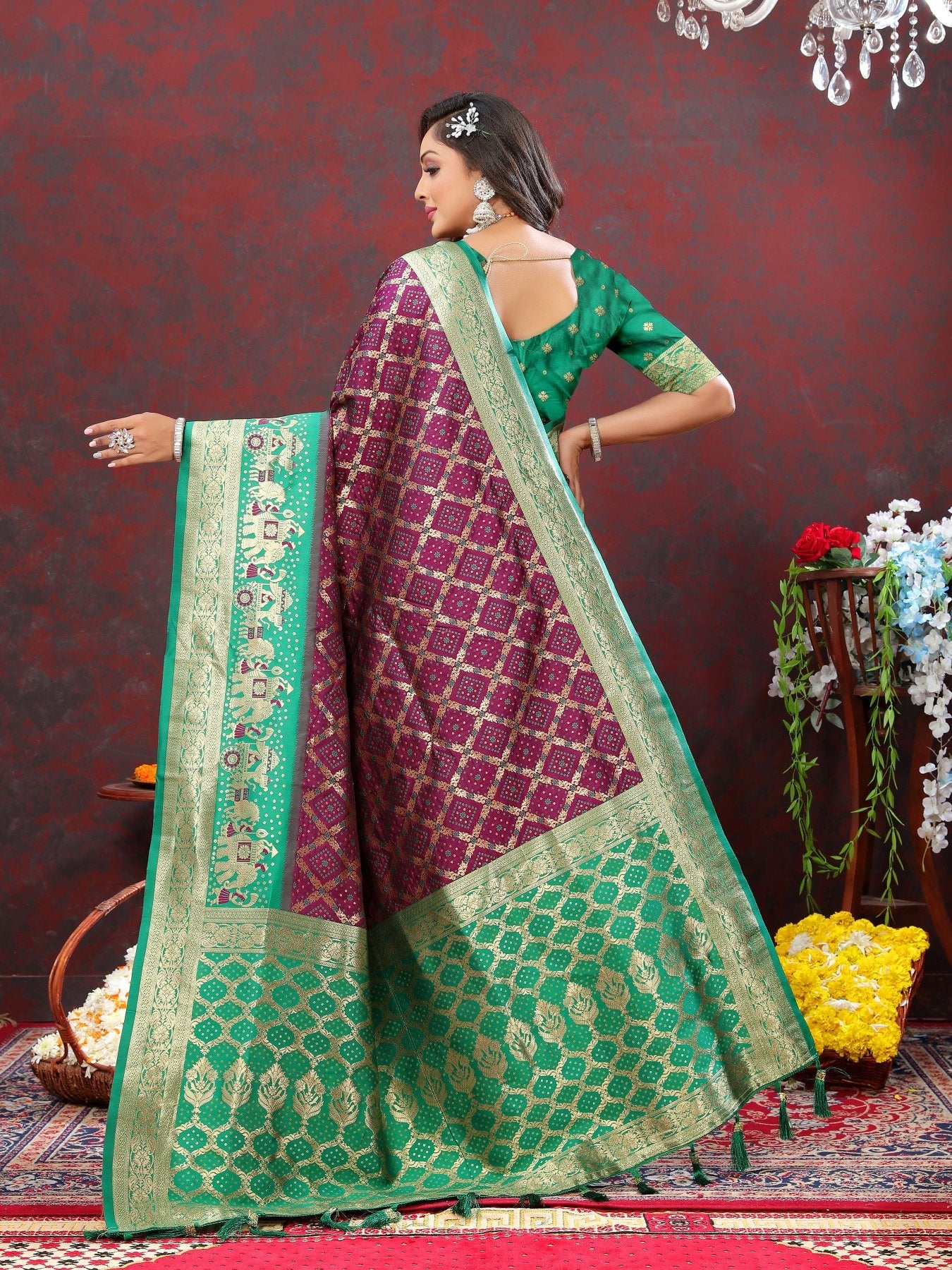 Adoring Wine Patola Silk Saree with Glorious Blouse Piece