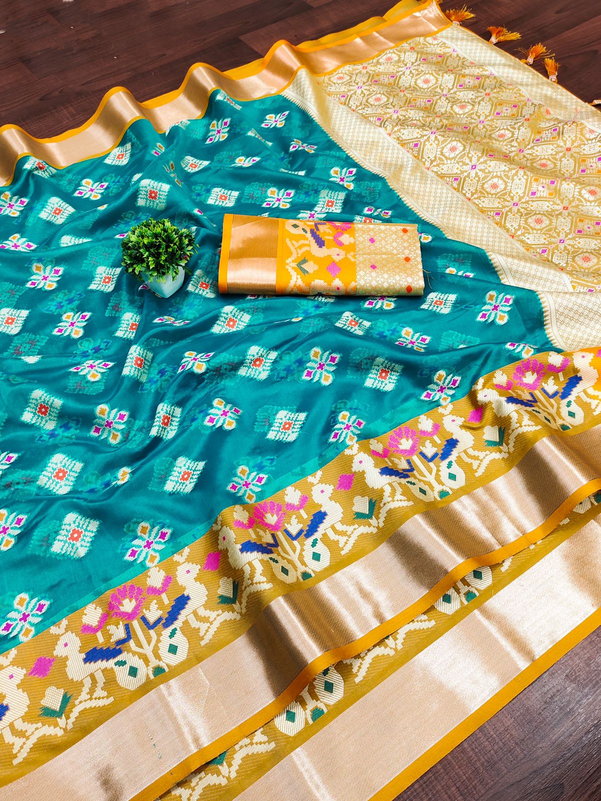 Preferable Firozi Organza Silk Saree With Engrossing Blouse Piece