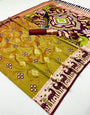 Grandiose Mustard Soft Banarasi Ikkat Saree With Beautiful Blouse Piece
