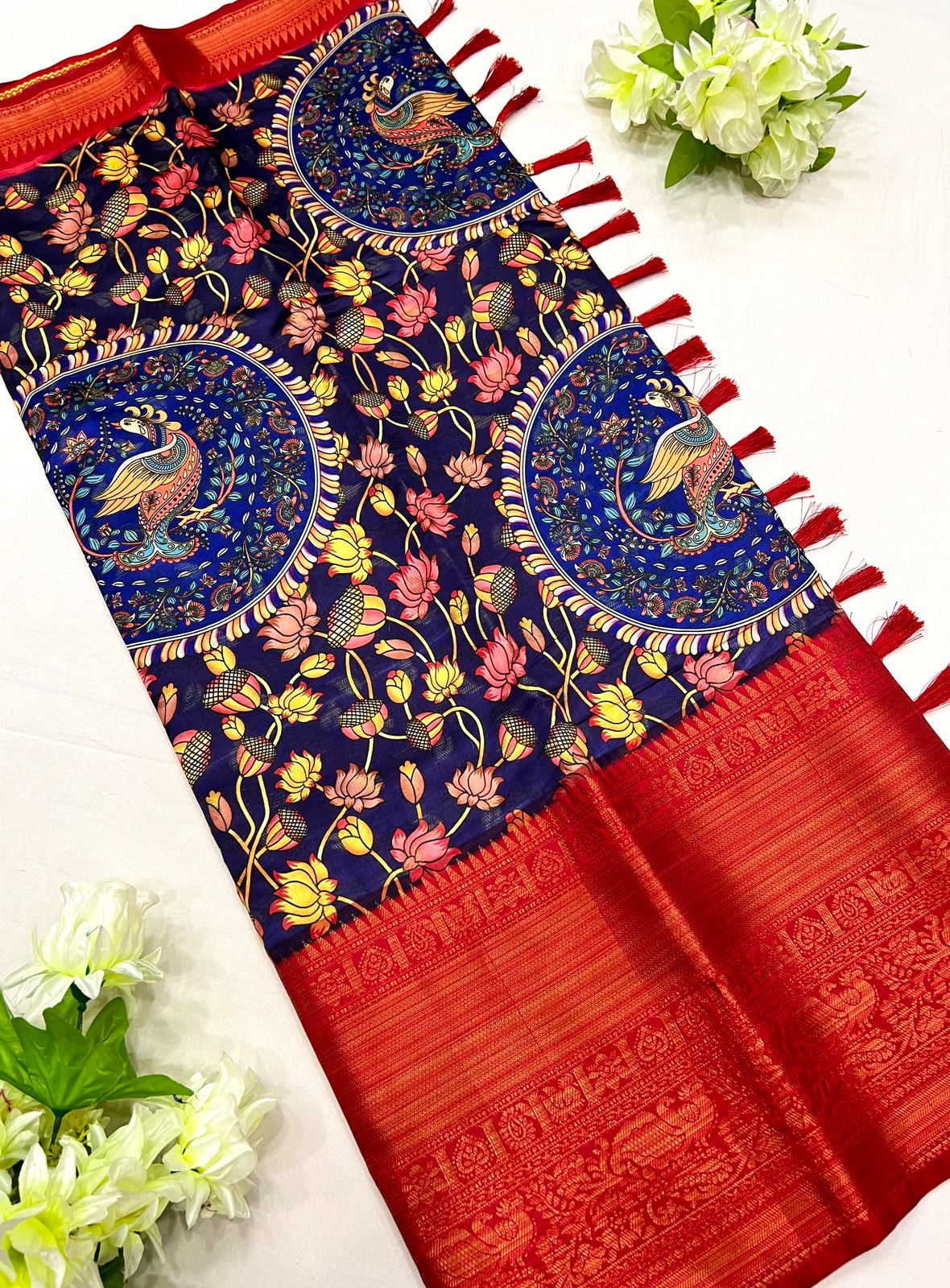 Gleaming Royal Blue Kalamkari Printed Saree With Glowing Blouse Piece