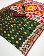 Innovative Dark Green Soft Banarasi Ikkat Saree With Glowing Blouse Piece