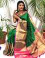 Exuberant Green Banarasi Silk Saree With Snazzy Blouse Piece