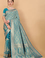 Rhapsodic Firozi Banarasi Silk Saree With Ornate Blouse Piece