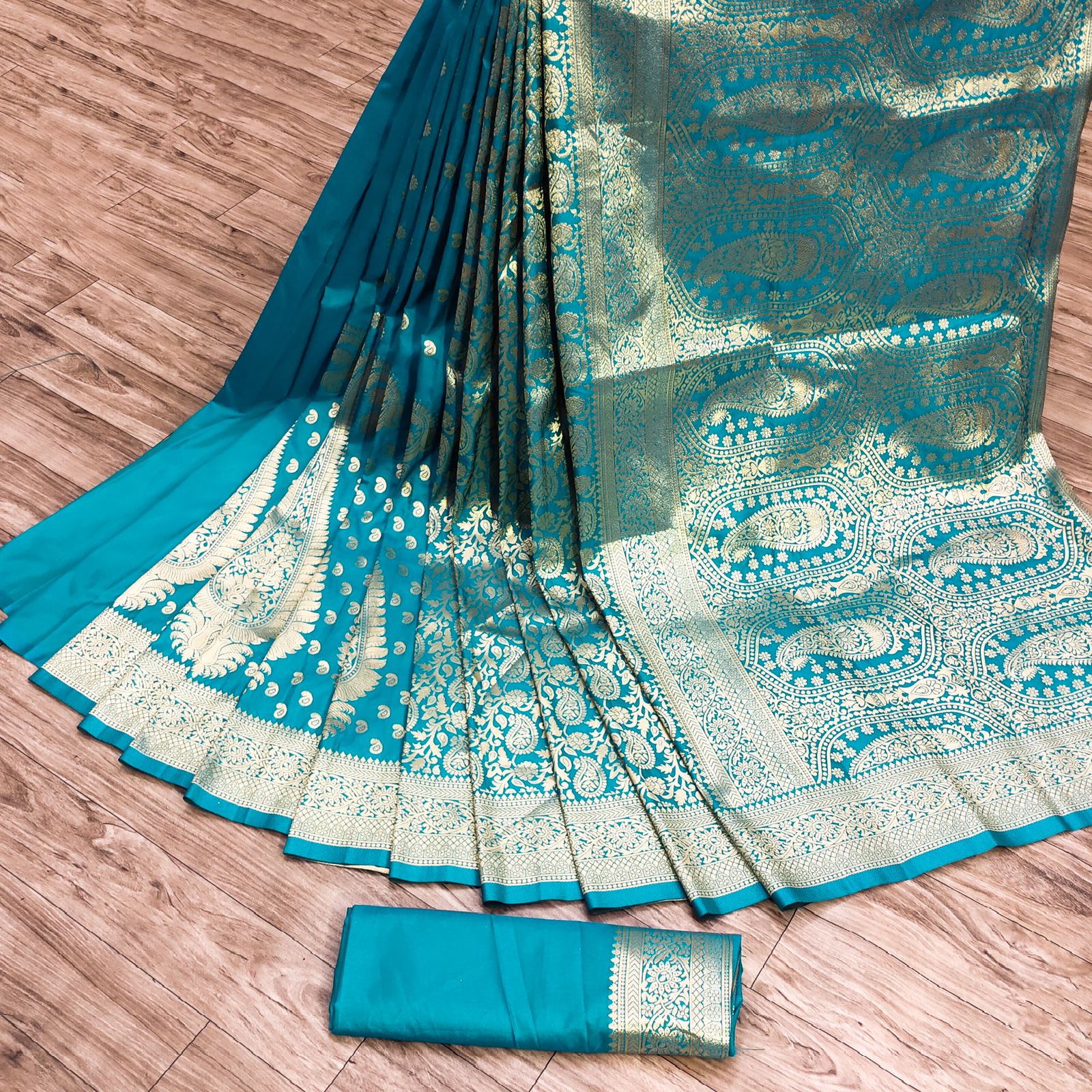 Rhapsodic Firozi Banarasi Silk Saree With Ornate Blouse Piece