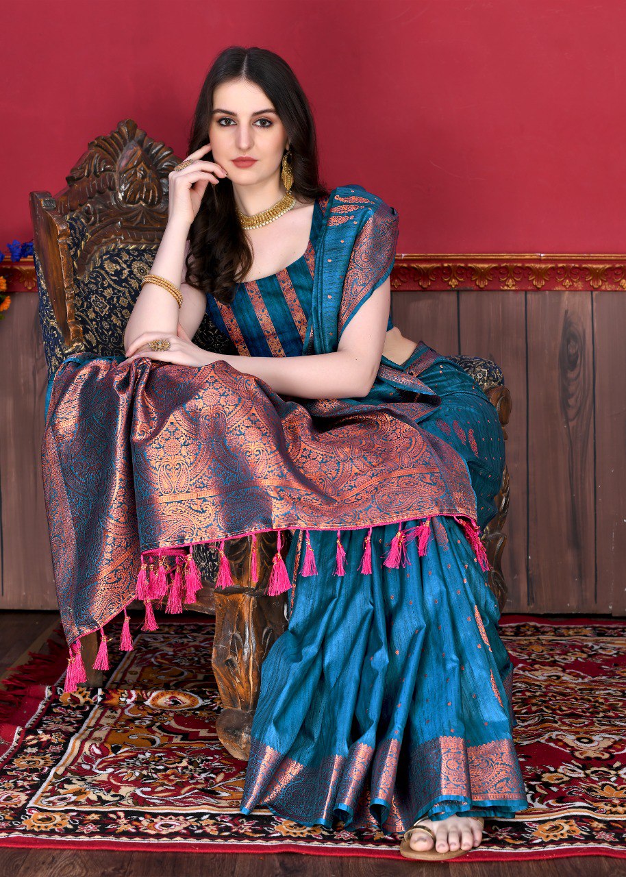 Nectarous Teal Blue Soft Banarasi Silk Saree With Fugacious Blouse Piece