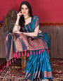 Nectarous Teal Blue Soft Banarasi Silk Saree With Fugacious Blouse Piece