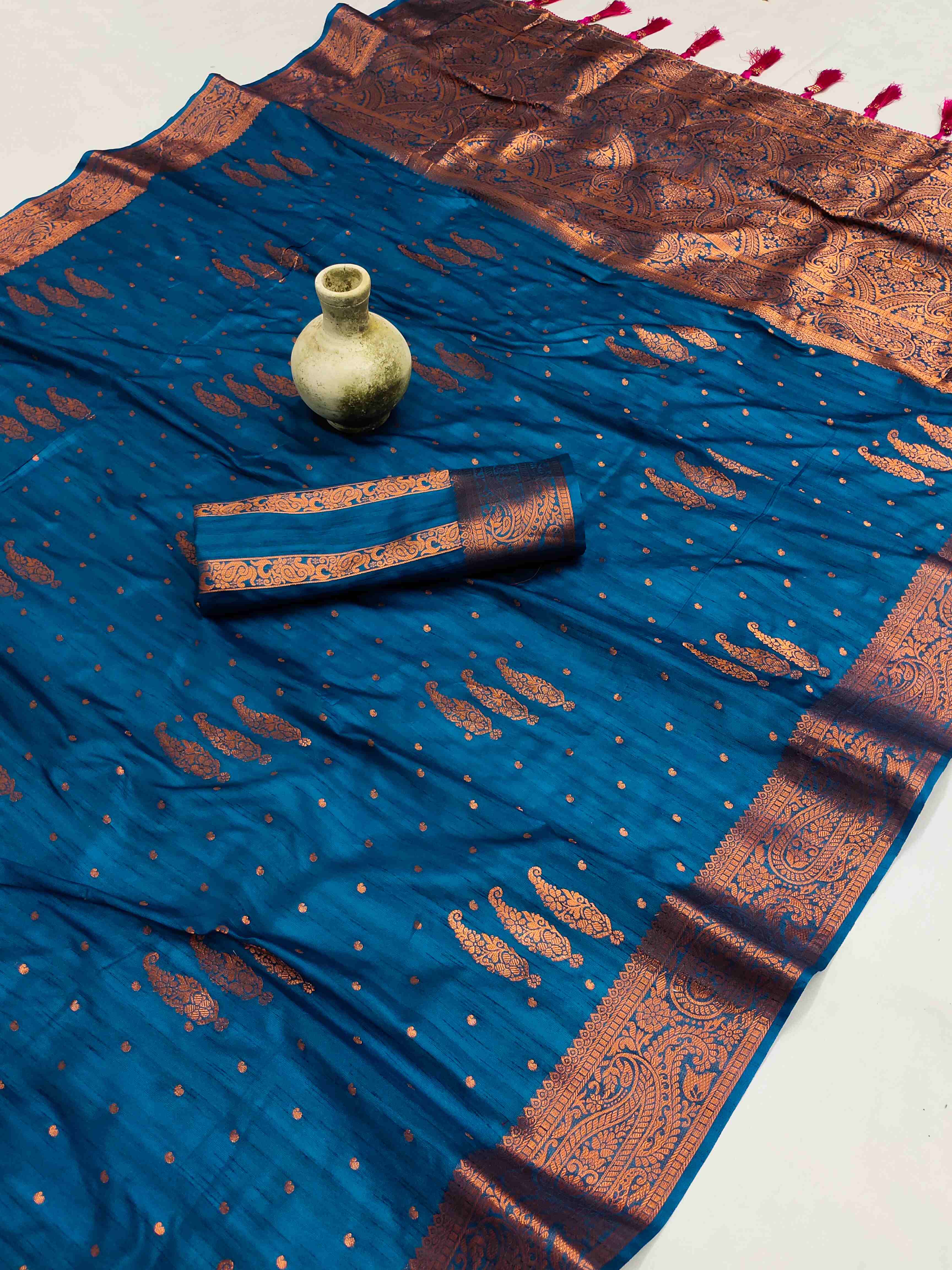 Nectarous Teal Blue Soft Banarasi Silk Saree With Fugacious Blouse Piece