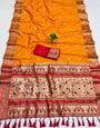 Angelic Orange Soft Banarasi Silk Saree With Efflorescence Blouse Piece