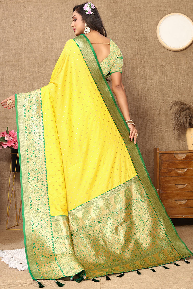 Dazzling Yellow Soft Banarasi Silk Saree With Breathtaking Blouse Piece