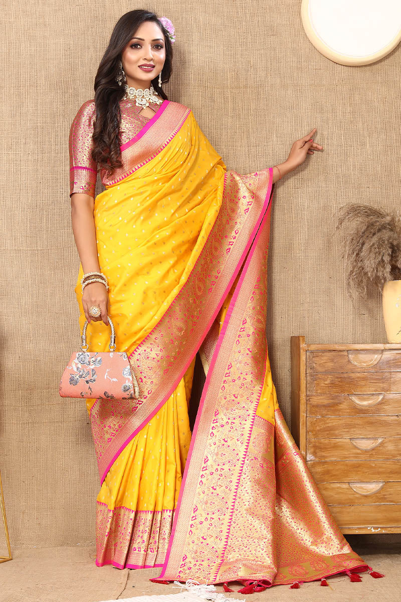 Gratifying Yellow Soft Banarasi Silk Saree With Adorable Blouse Piece