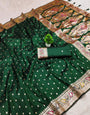 Extraordinary Dark Green Soft Banarasi Silk Saree With Vestigial Blouse Piece